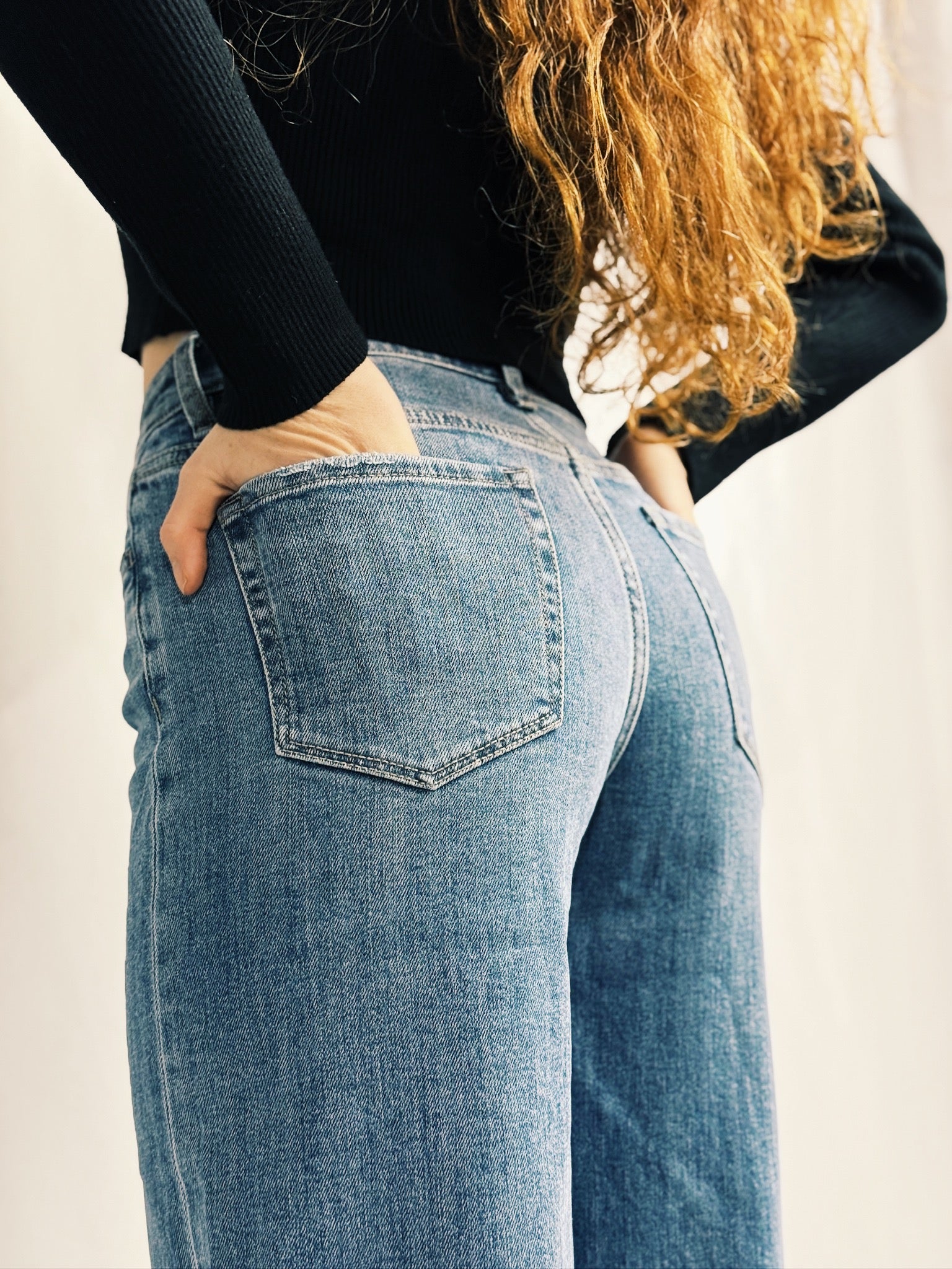 Super High Rise Medium Wash Raw Hem Wide Leg Jeans