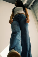 Super High Rise Medium Wash Raw Hem Wide Leg Jeans