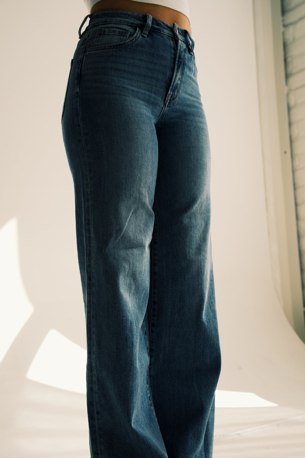 Super High Rise Medium Wash Raw Hem Wide Leg Jeans