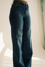 Super High Rise Medium Wash Raw Hem Wide Leg Jeans